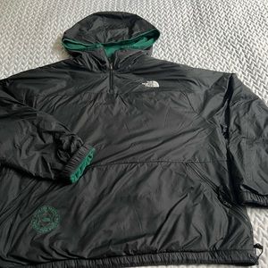 Reversible North Face fleece/nylon windbreaker pullover.